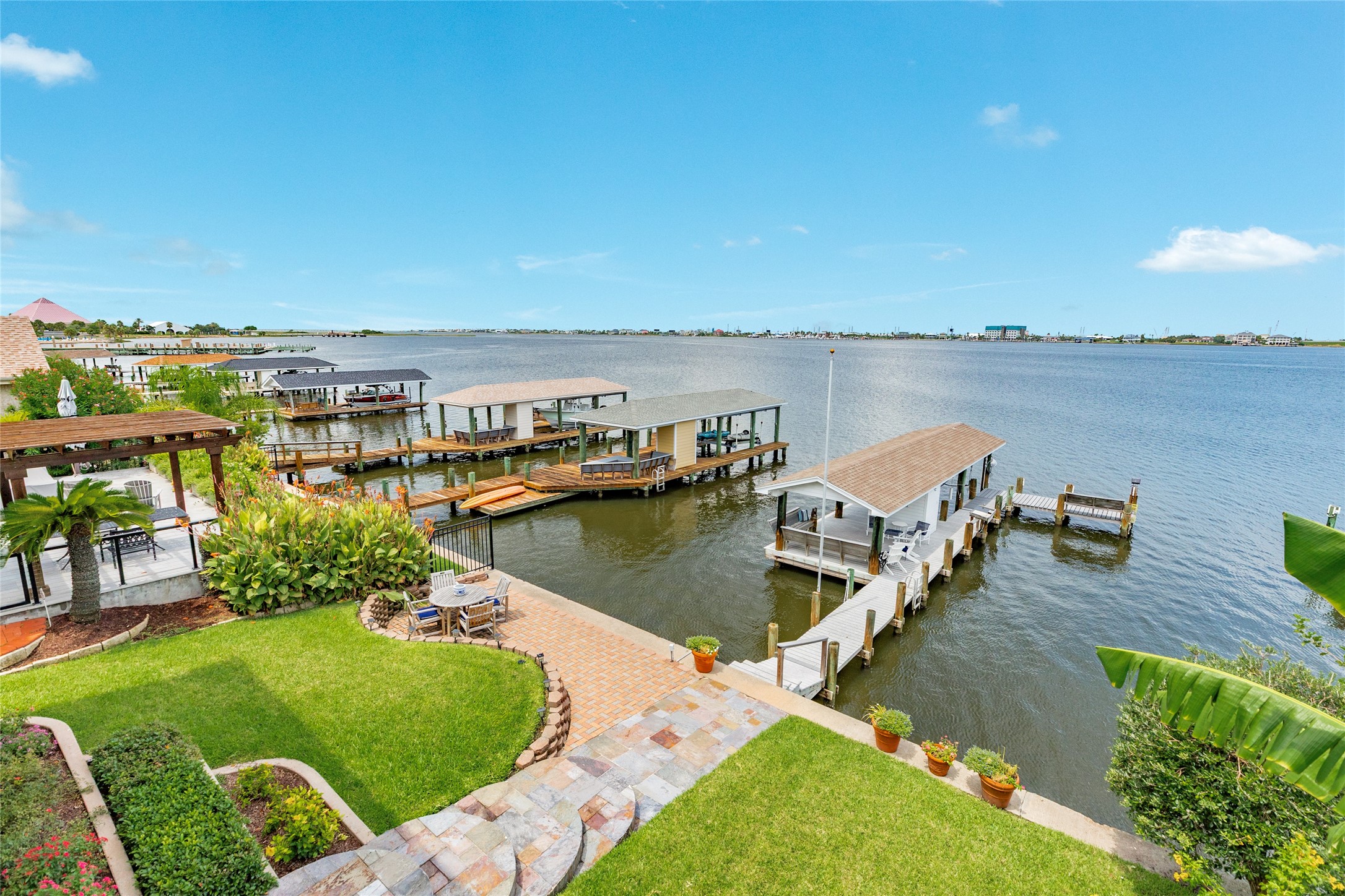 7306 Offats Point Circle Galveston, TX 77551 - Photo 25 of 50 a view of a lake with a lake