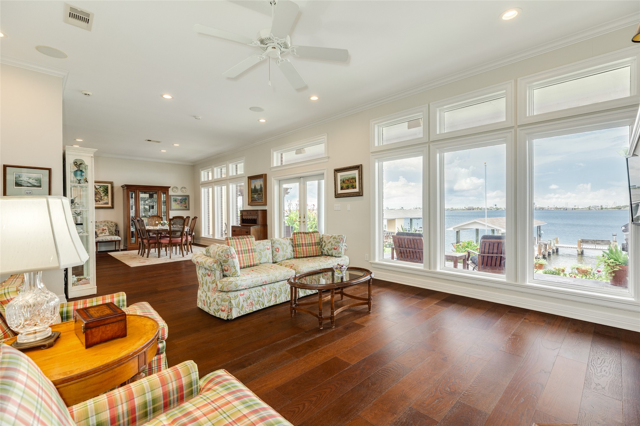 7306 Offats Point Circle Galveston, TX 77551 - Photo 26 of 50 a living room with furniture and a large window