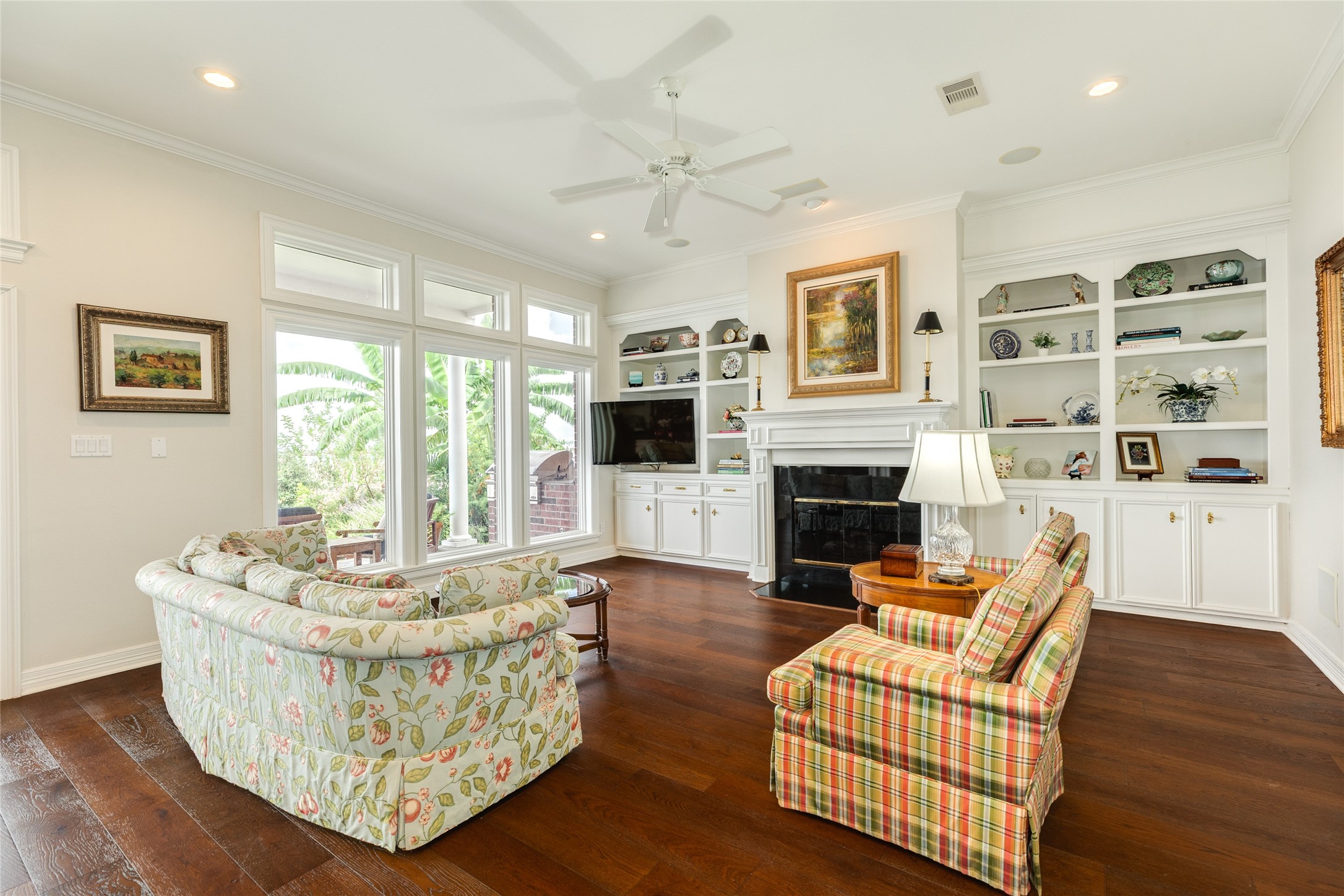 7306 Offats Point Circle Galveston, TX 77551 - Photo 28 of 50 a living room with furniture fireplace and flat screen tv