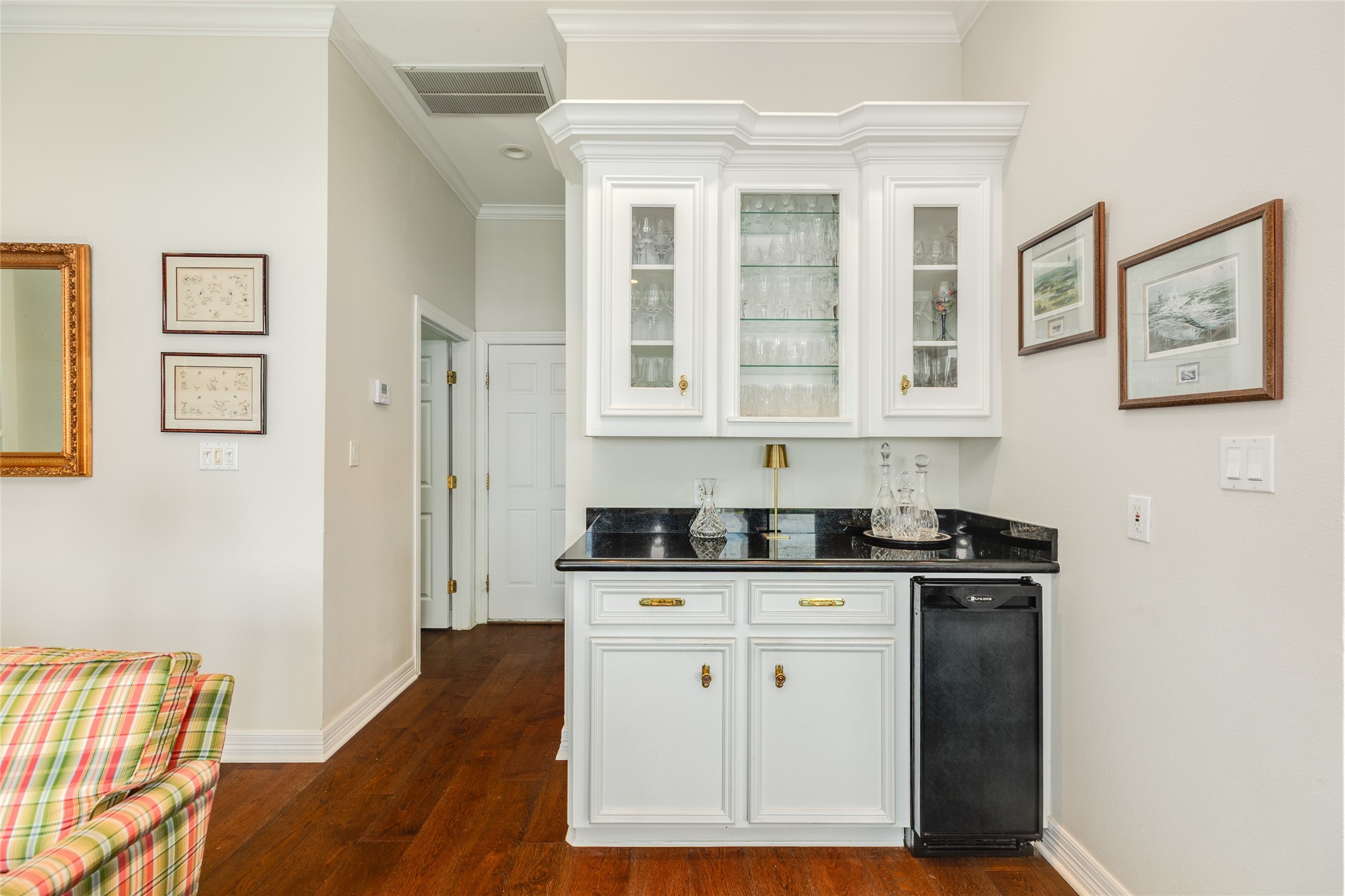 7306 Offats Point Circle Galveston, TX 77551 - Photo 30 of 50 a view of cabinets with wooden floor