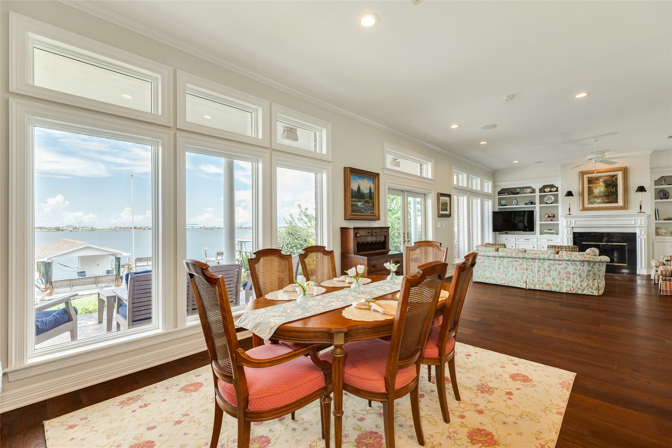 7306 Offats Point Circle Galveston, TX 77551 - Photo 31 of 50 a dining room with furniture window wooden floor