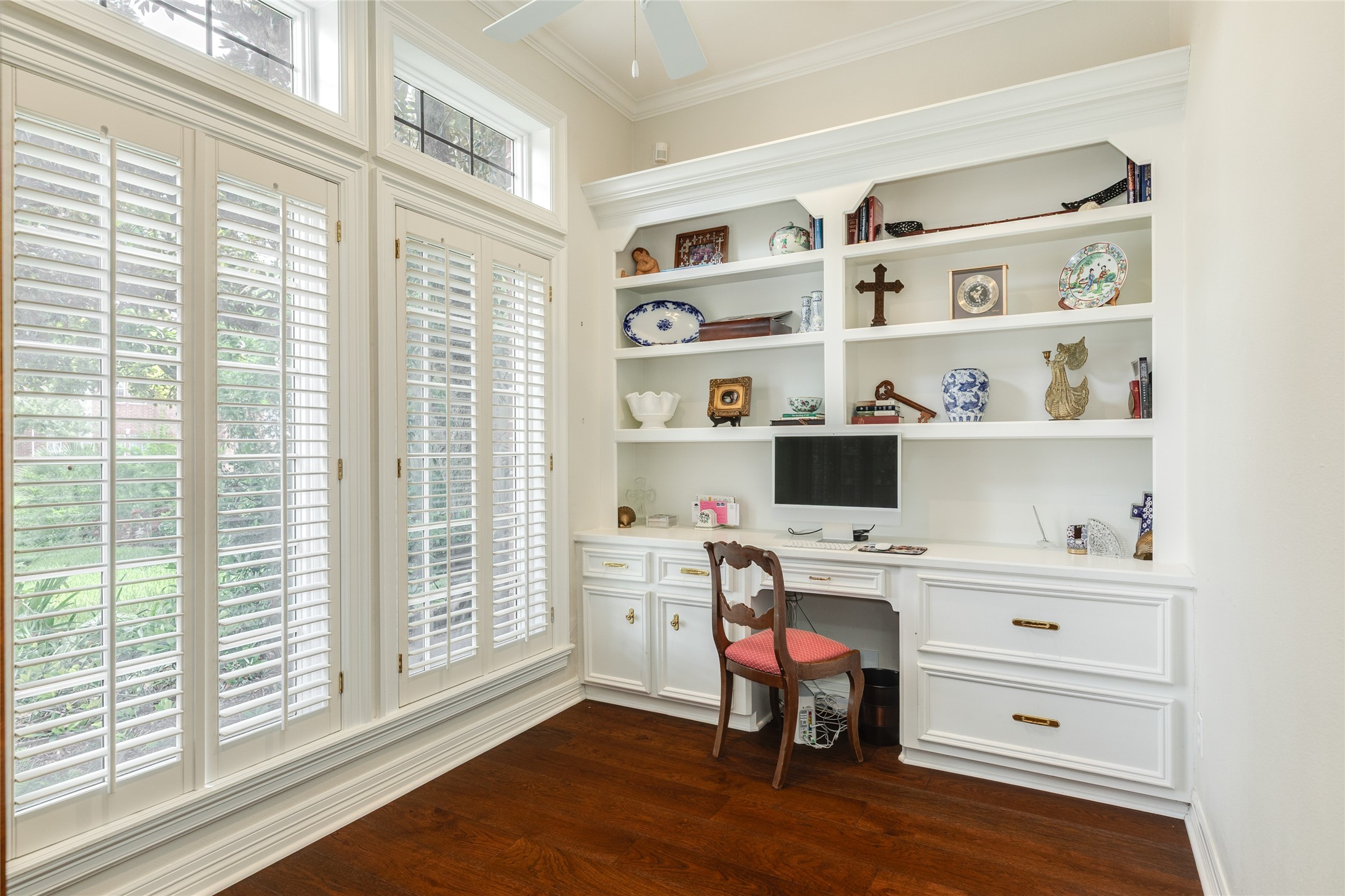 7306 Offats Point Circle Galveston, TX 77551 - Photo 38 of 50 a view of a workspace with furniture and a window