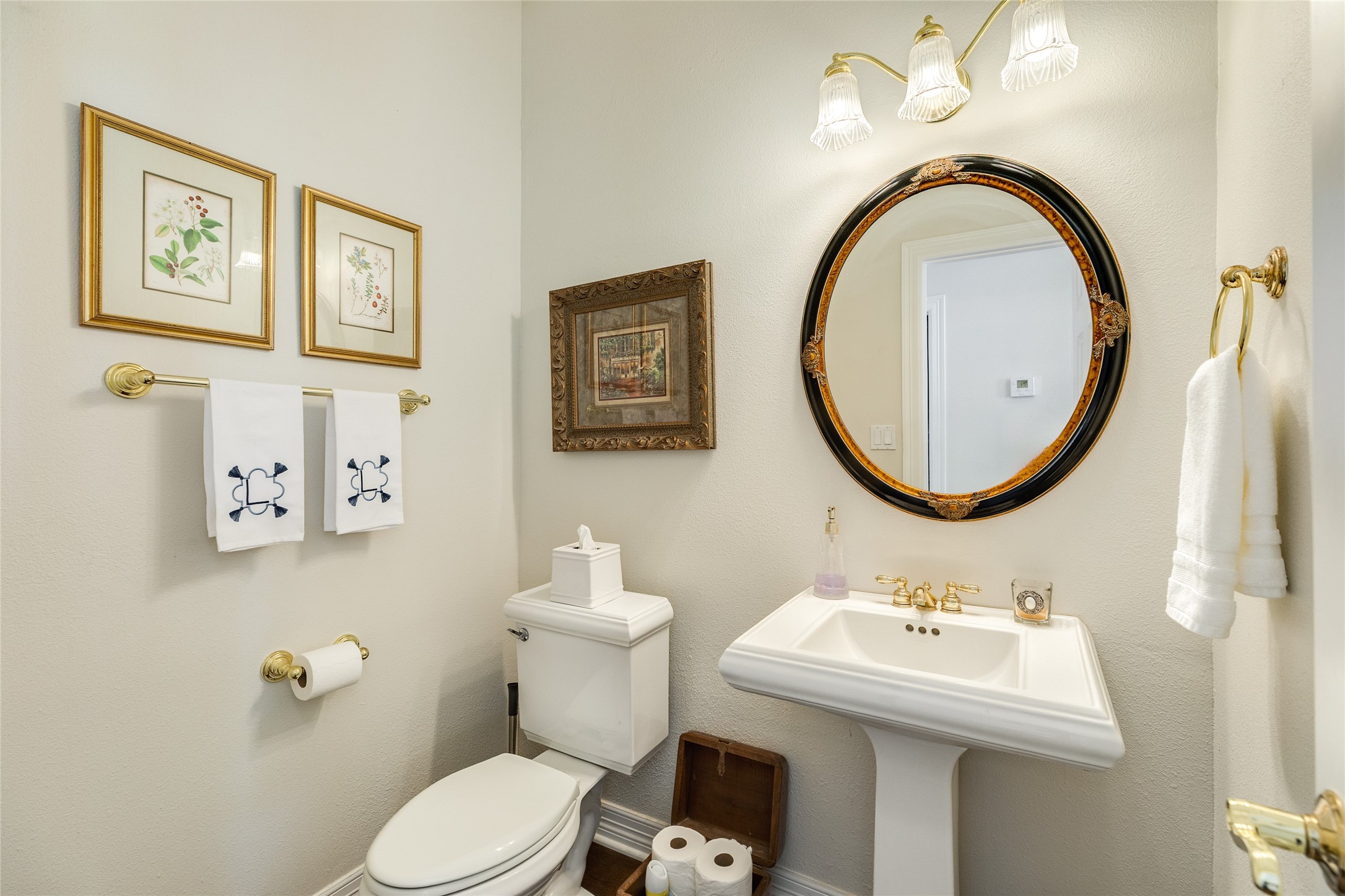 7306 Offats Point Circle Galveston, TX 77551 - Photo 50 of 50 a bathroom with a toilet a sink and a mirror