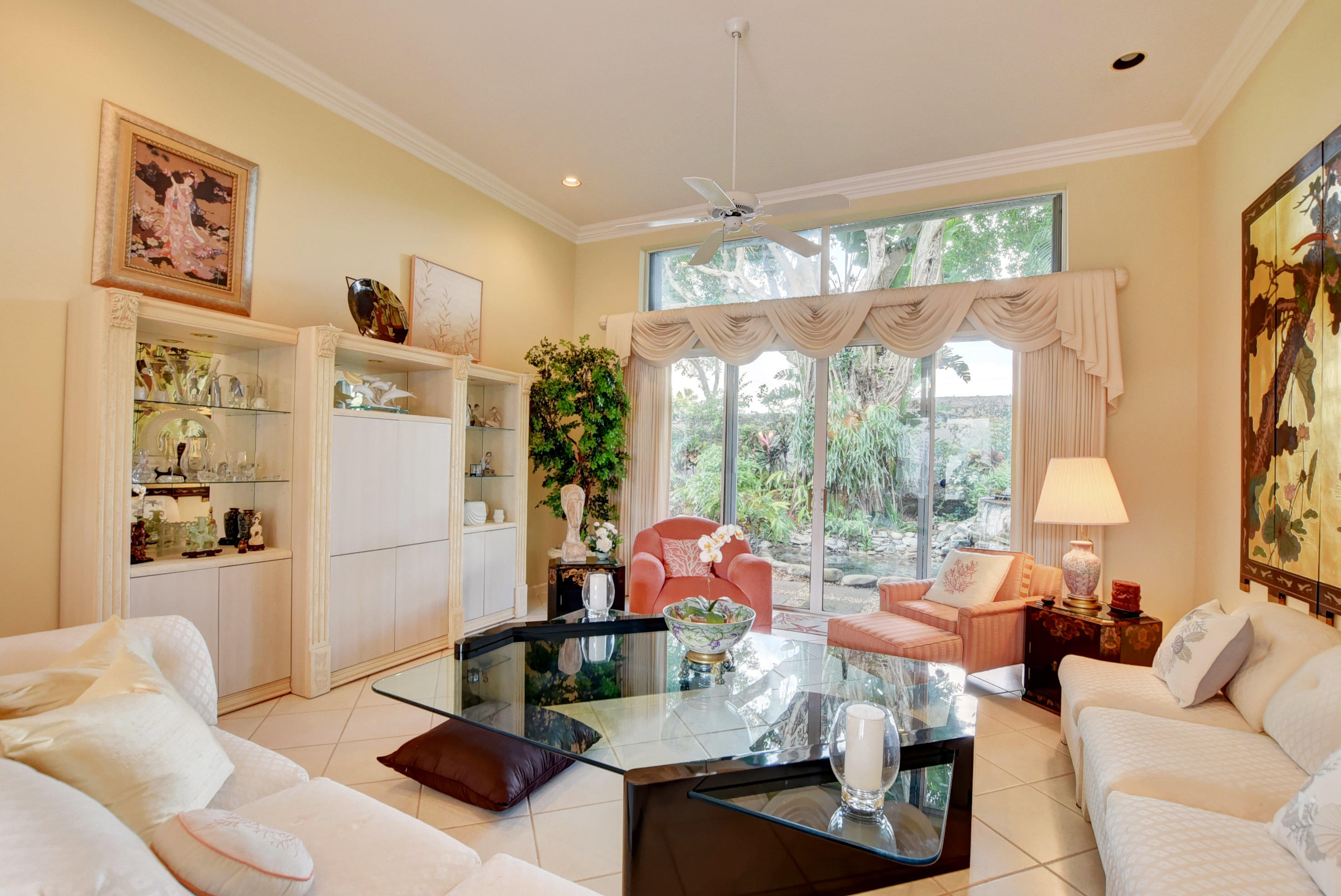 6342 Northwest 23rd Street Boca Raton, FL 33434 - Photo 13 of 50 Living room view to back patio waterfall
