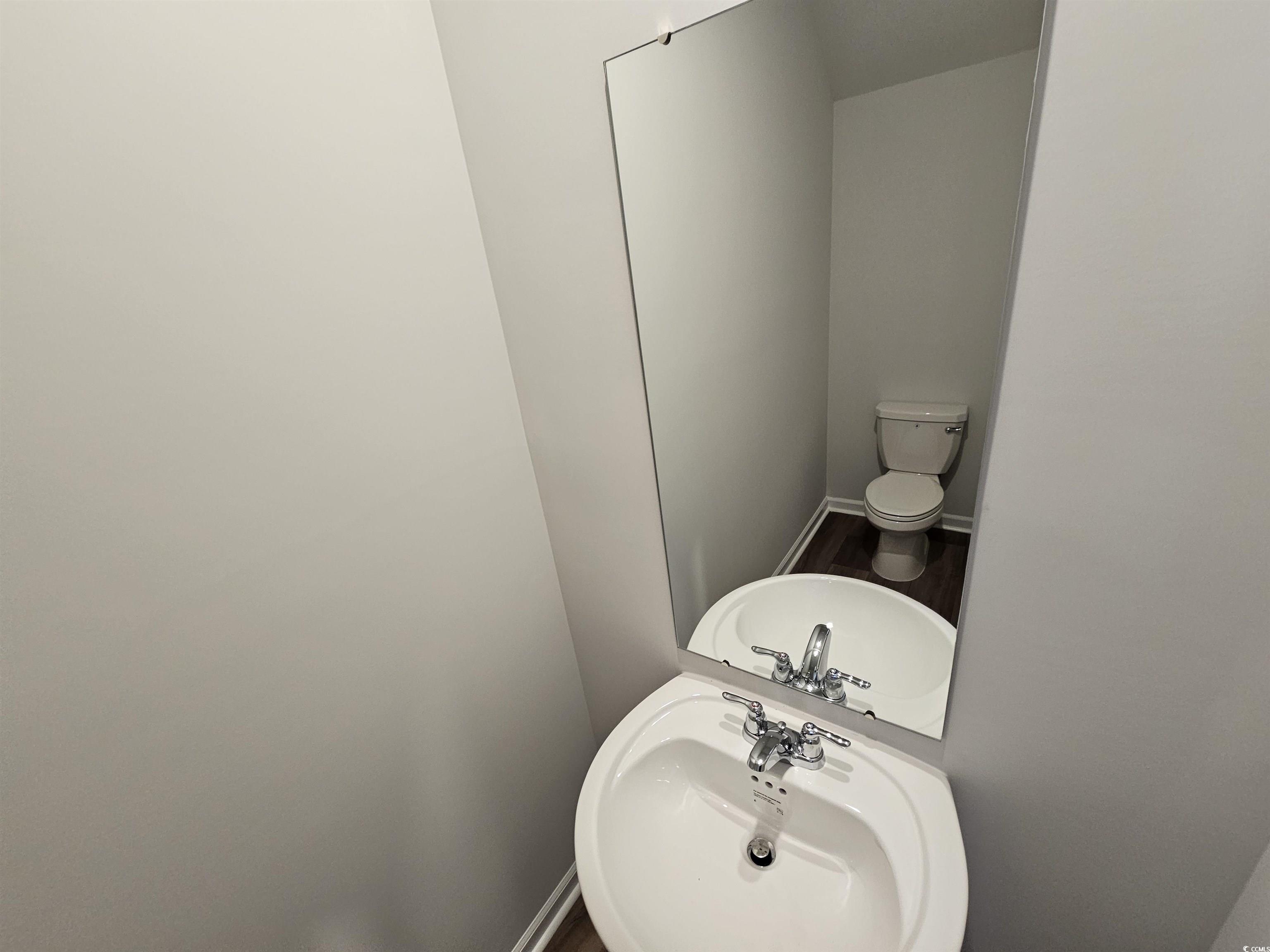 805 Wapama Street Little River, SC 29566 - Photo 5 of 25 Bathroom featuring a sink