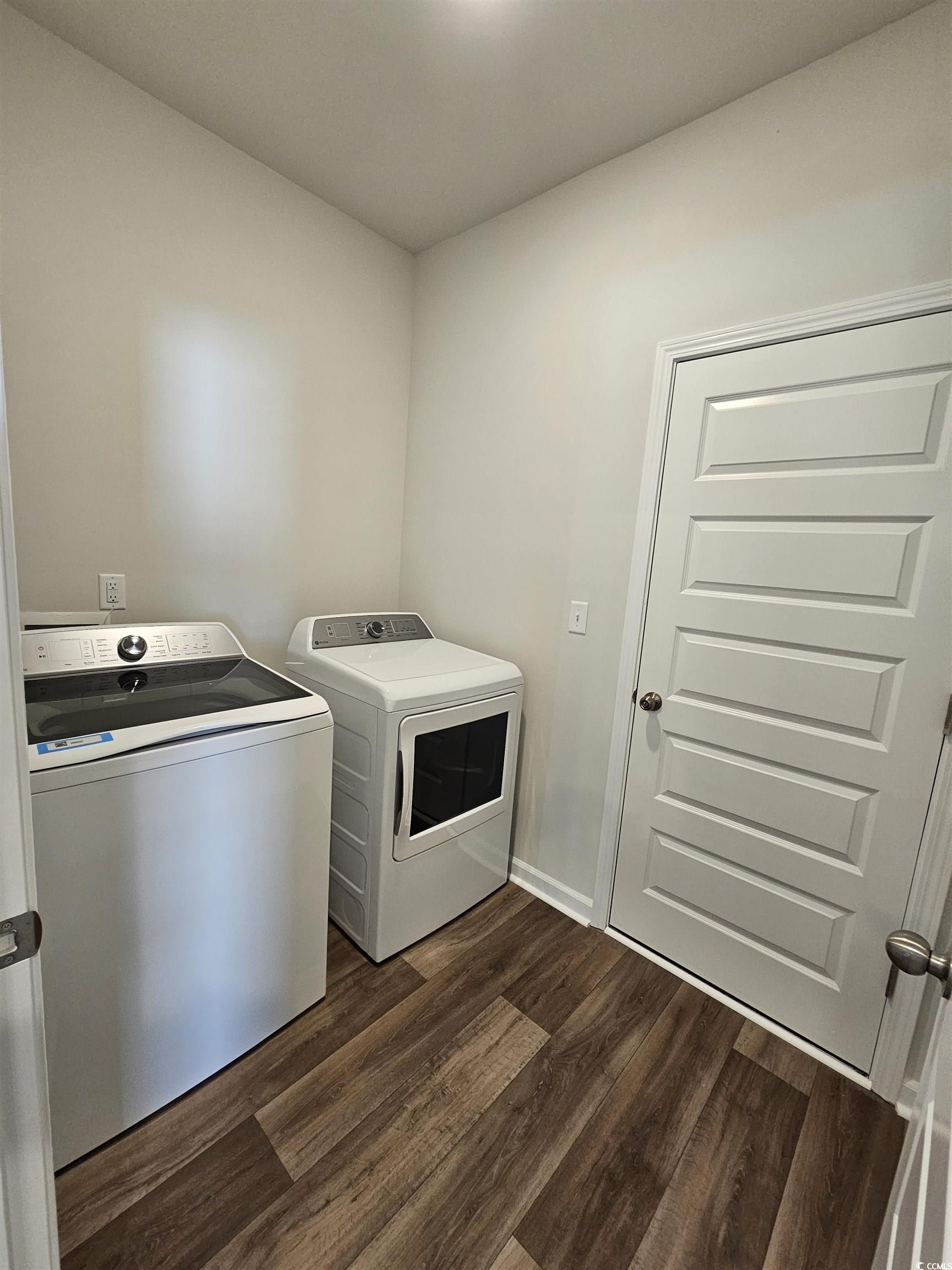 805 Wapama Street Little River, SC 29566 - Photo 7 of 25 Laundry room featuring dark wood-style flooring and independent washer and dryer