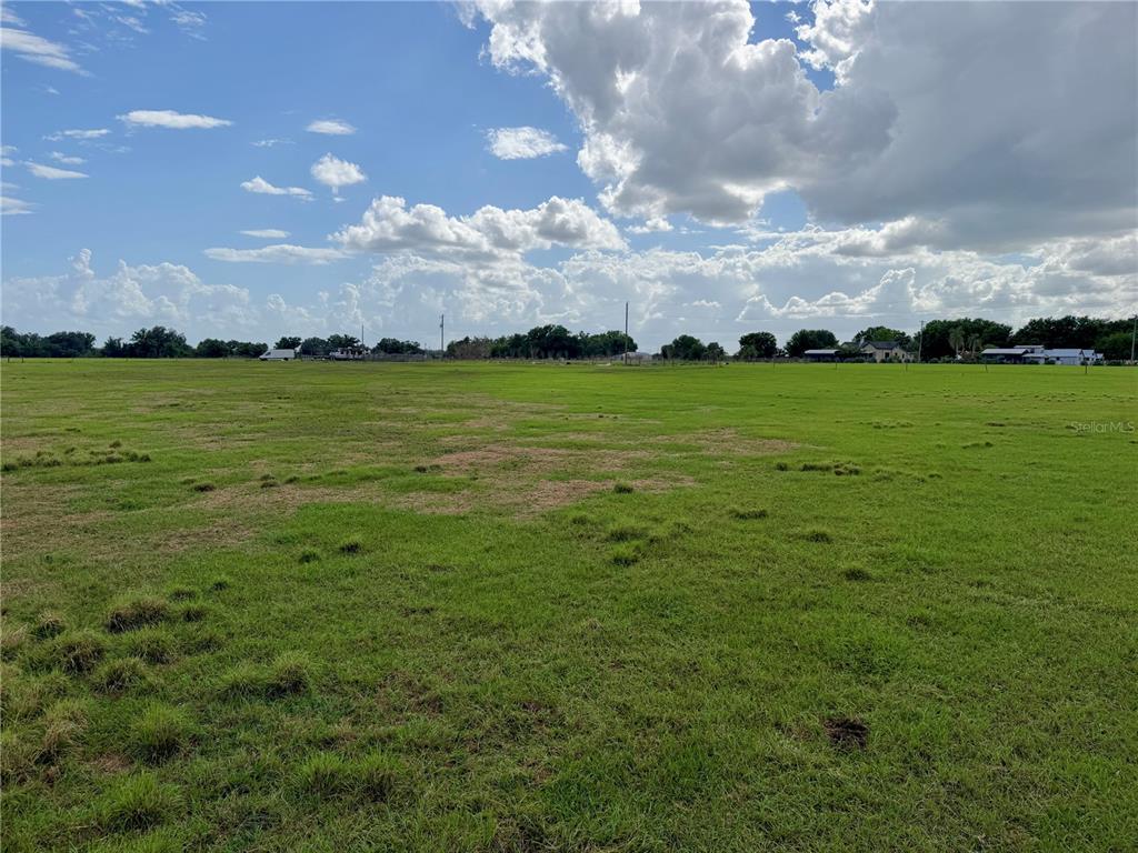 64 West St Road Wauchula, FL 33873 - Photo 7 of 12 a view of an ocean and a yard