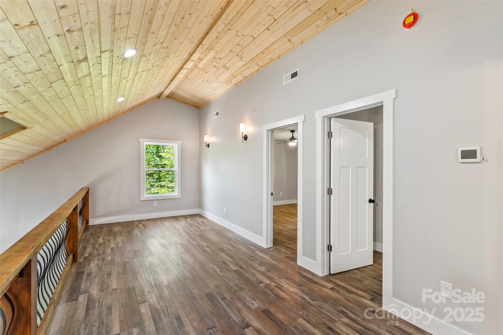511 Blue Ridge Drive North Marion, NC 28752 - Photo 22 of 41 a view of livingroom with hardwood floor and window