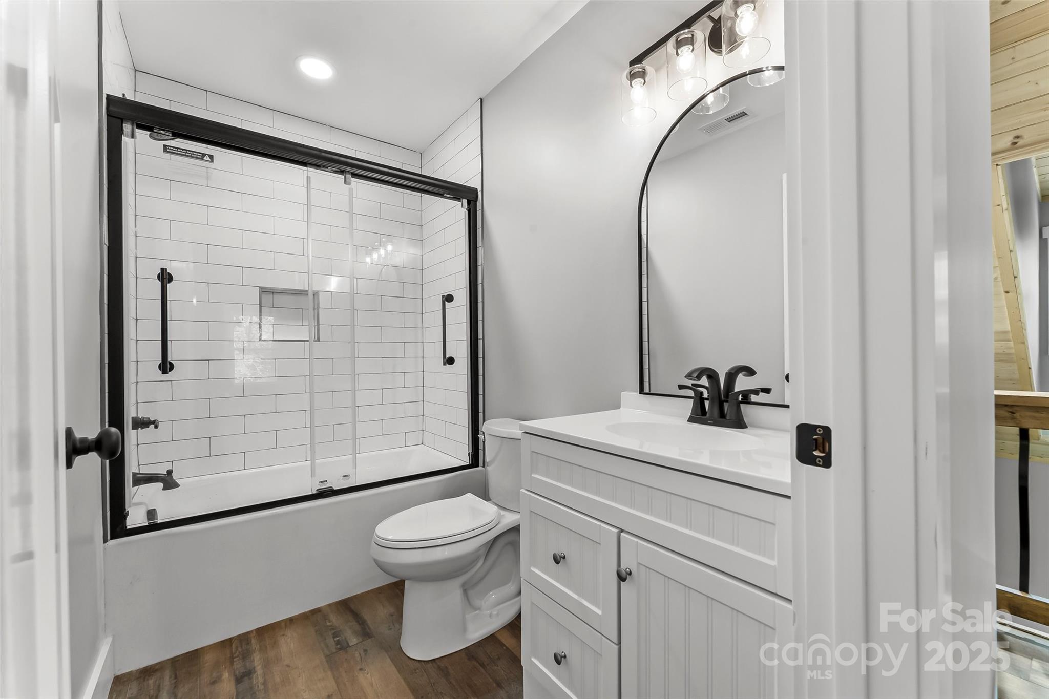 511 Blue Ridge Drive North Marion, NC 28752 - Photo 28 of 41 a bathroom with a sink toilet and shower