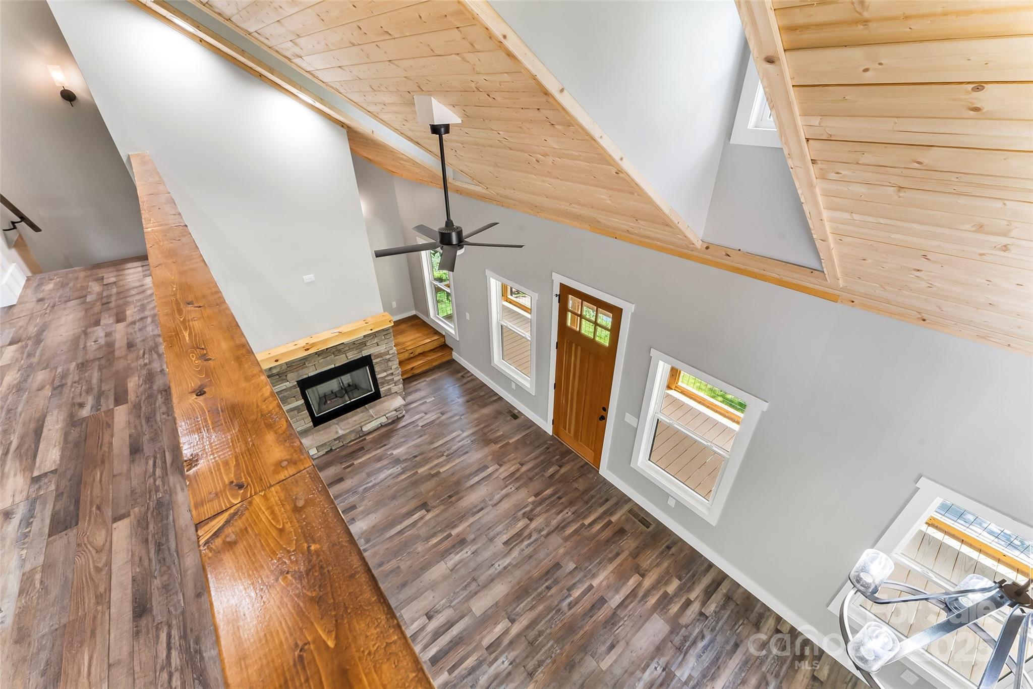 511 Blue Ridge Drive North Marion, NC 28752 - Photo 30 of 41 a view of a hallway with wooden floor and stairs