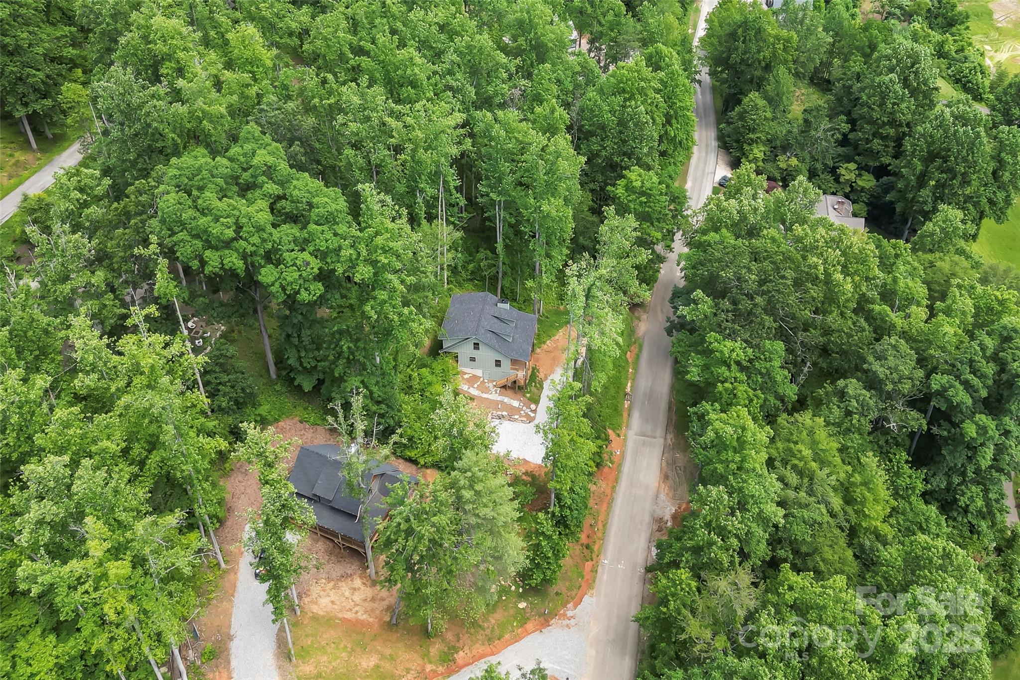 511 Blue Ridge Drive North Marion, NC 28752 - Photo 38 of 41 an aerial view of residential house with outdoor space and trees all around