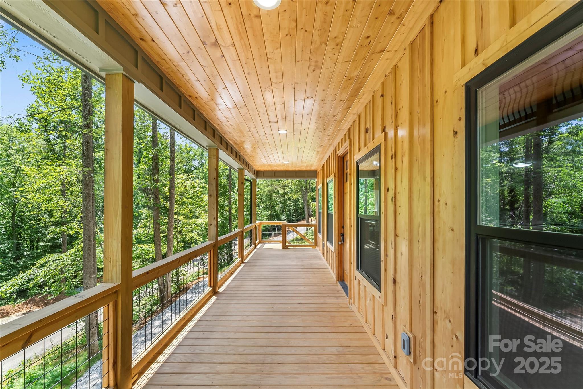 511 Blue Ridge Drive North Marion, NC 28752 - Photo 7 of 41 a view of a balcony with wooden floor