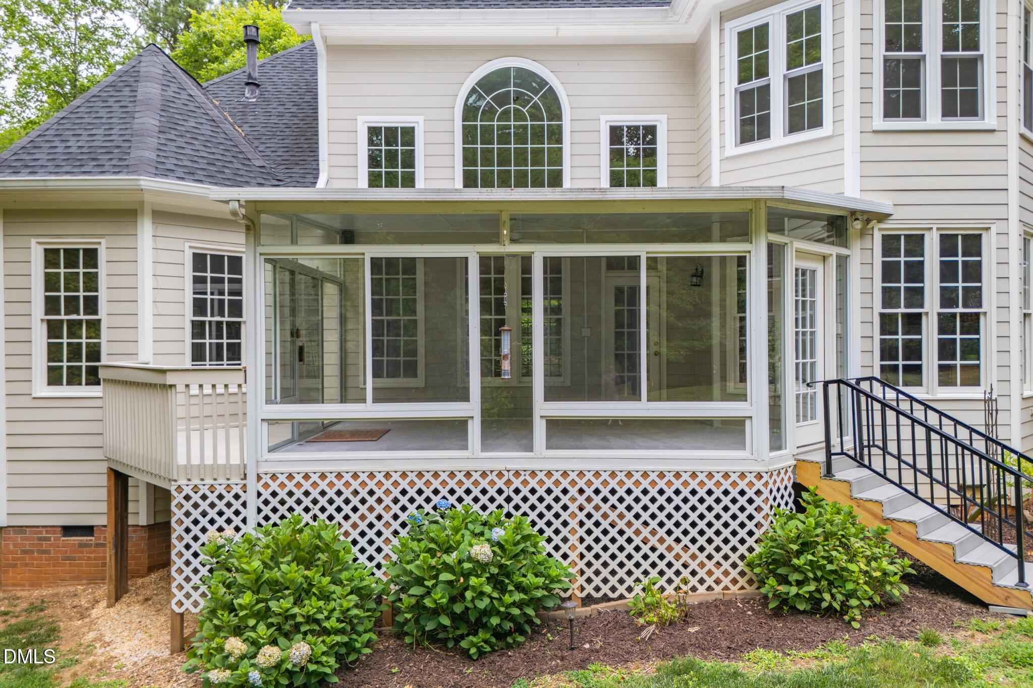 3209 Nimich Pond Way Raleigh, NC 27613 - Photo 56 of 78 Enclosed screened porch overlooking the backyard, plus a gazebo and dedicated grilling patio for outdoor living