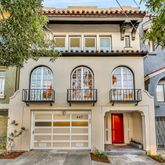 a front view of multiple houses