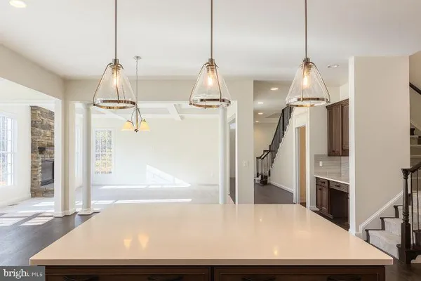 a view of a living room and entryway