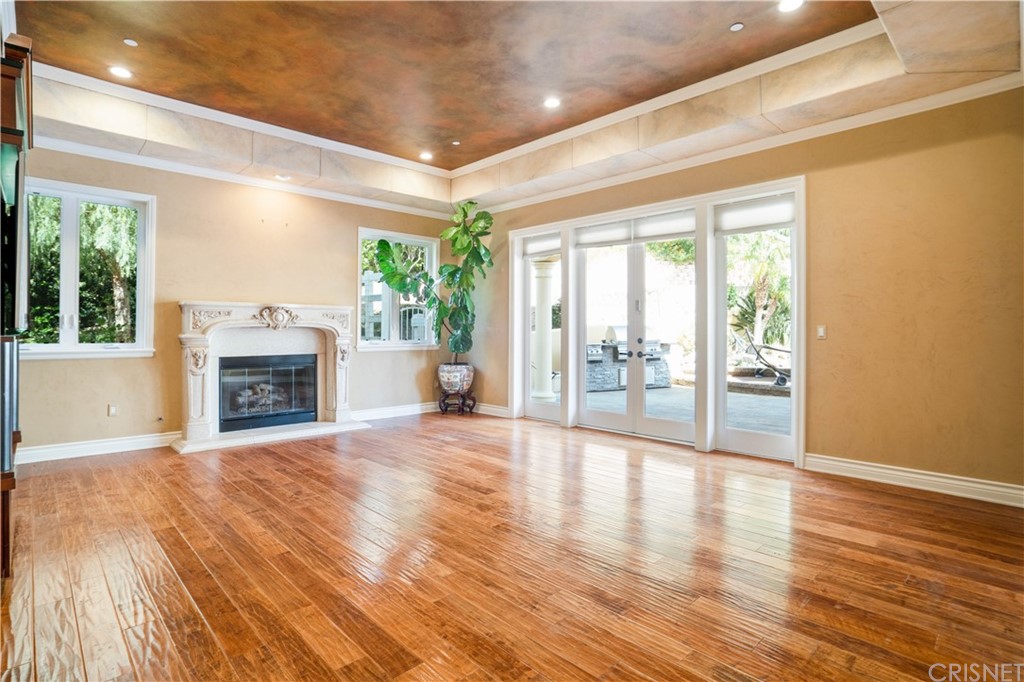 75 North Coolwater Road Bell Canyon, CA 91307 - Photo 14 of 72 a view of an empty room with a fireplace and a window