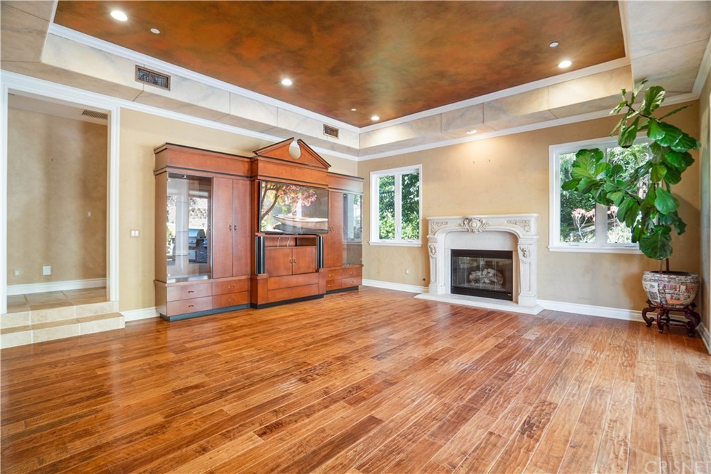 75 North Coolwater Road Bell Canyon, CA 91307 - Photo 15 of 72 a view of empty room with floor to ceiling window and fireplace