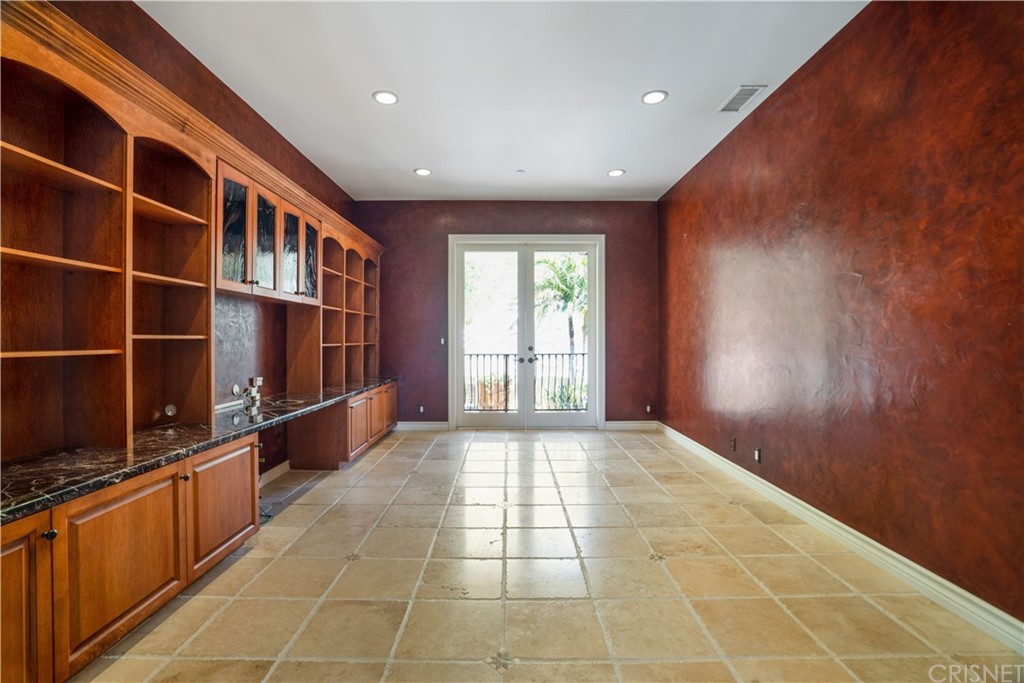 75 North Coolwater Road Bell Canyon, CA 91307 - Photo 37 of 72 a view of an empty room with windows