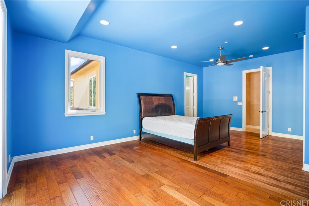 75 North Coolwater Road Bell Canyon, CA 91307 - Photo 44 of 72 a bedroom with a bed and window