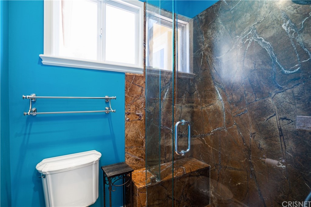 75 North Coolwater Road Bell Canyon, CA 91307 - Photo 46 of 72 a bathroom with a toilet and a shower