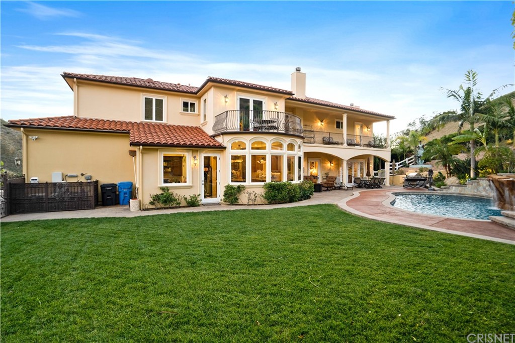 75 North Coolwater Road Bell Canyon, CA 91307 - Photo 58 of 72 a view of a house with a yard porch and sitting area