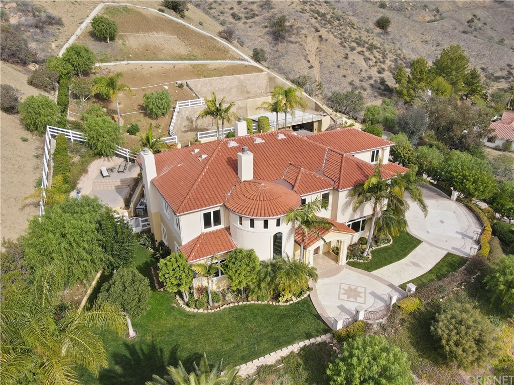 75 North Coolwater Road Bell Canyon, CA 91307 - Photo 64 of 72 an aerial view of a house with a garden