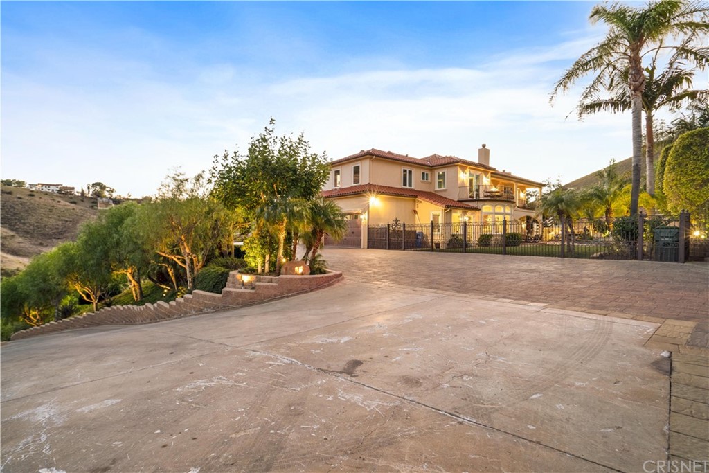 75 North Coolwater Road Bell Canyon, CA 91307 - Photo 66 of 72 a view of a house with a yard