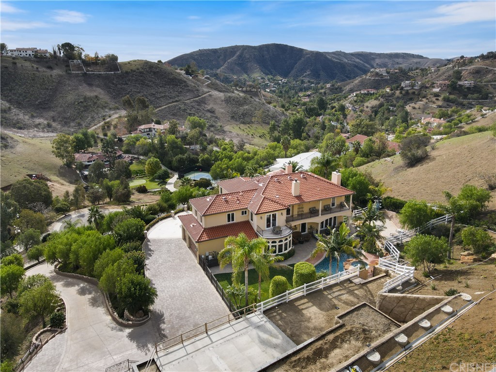 75 North Coolwater Road Bell Canyon, CA 91307 - Photo 70 of 72 an aerial view of a house with a garden