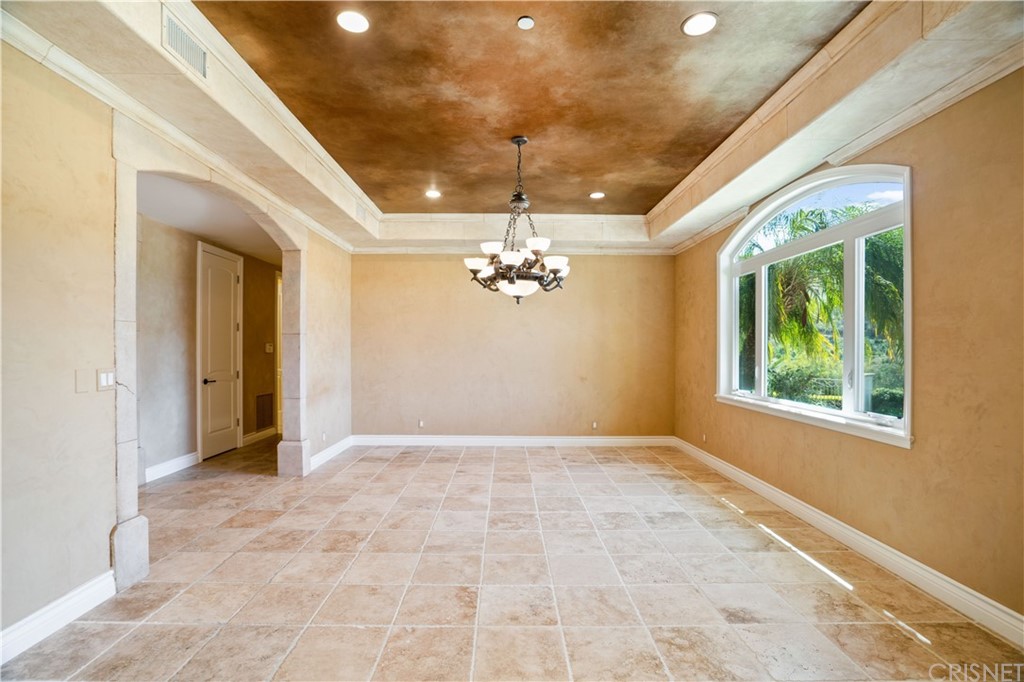 75 North Coolwater Road Bell Canyon, CA 91307 - Photo 9 of 72 a view of livingroom with window ceiling fan and window