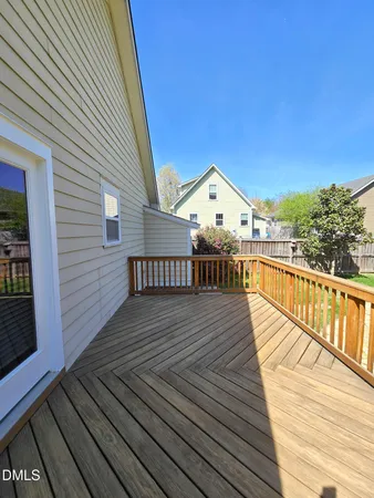 a view of deck with wooden floor and outdoor seating