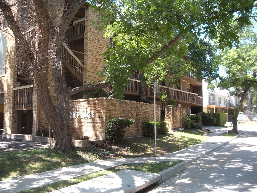 612 Park Place, Unit 305 Austin, TX 78705 - Photo 1 of 1 a backyard of a house with lots of green space