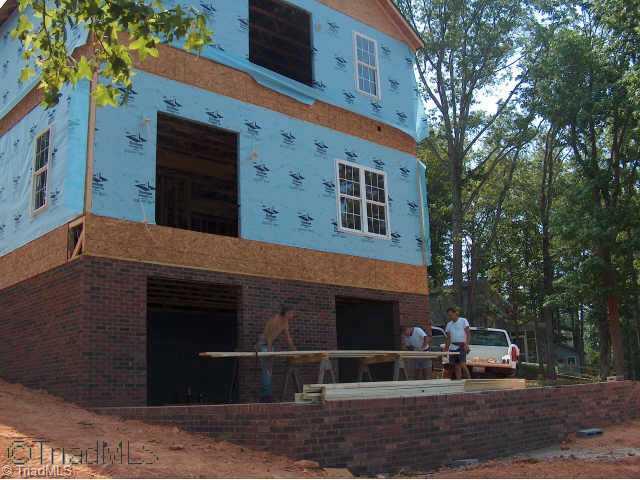 1731 Waterford Pointe Road Lexington, NC 27292 - Photo 2 of 3 Other. Lakeside view of home with patio