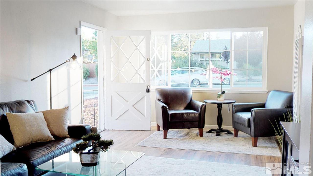 1860 Keystone Avenue Reno, NV 89503 - Photo 1 of 22 a living room with furniture and a potted plant