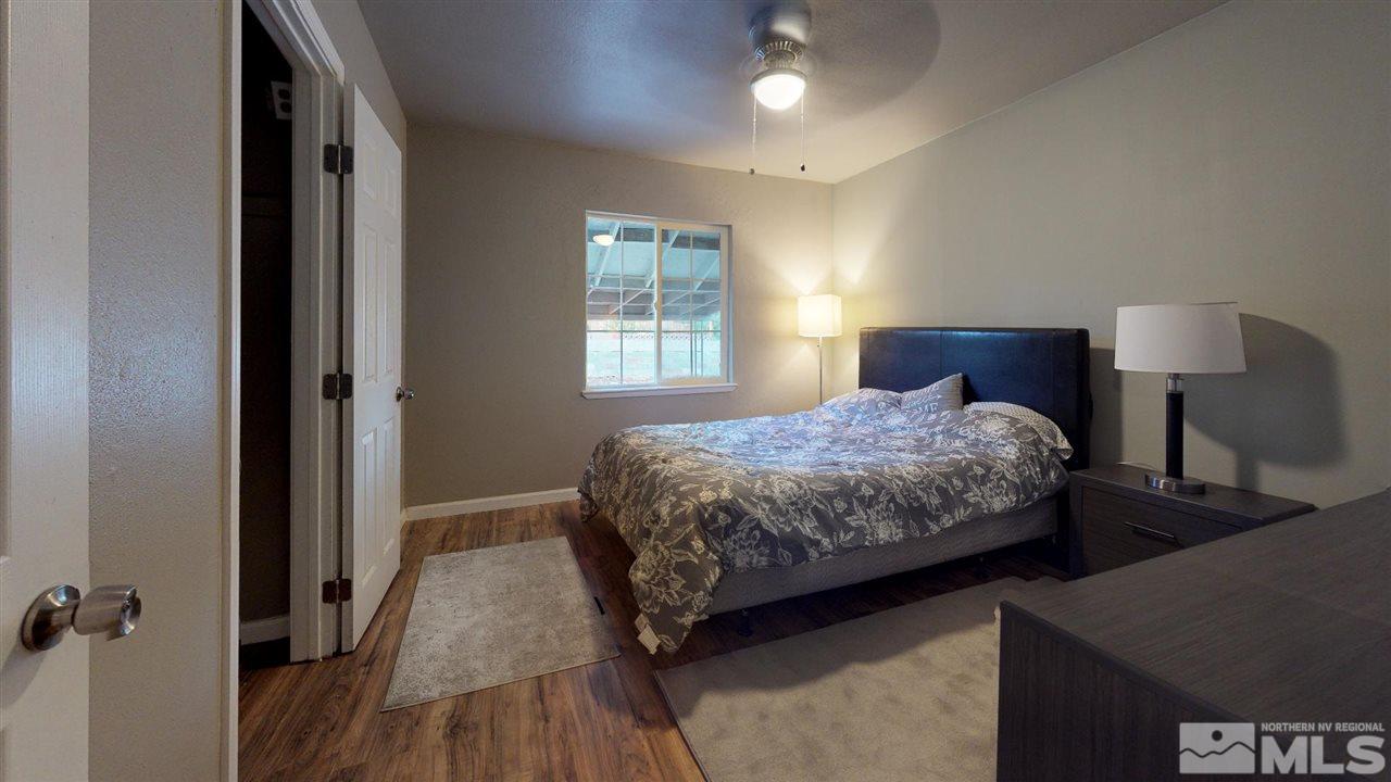1860 Keystone Avenue Reno, NV 89503 - Photo 15 of 22 a bedroom with a bed and a night stand