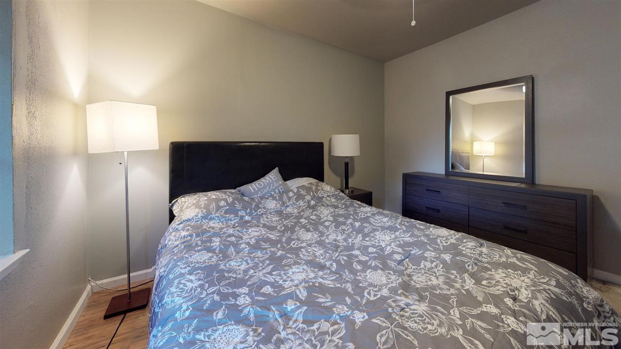 1860 Keystone Avenue Reno, NV 89503 - Photo 16 of 22 a bedroom with a bed and a mirror on dresser