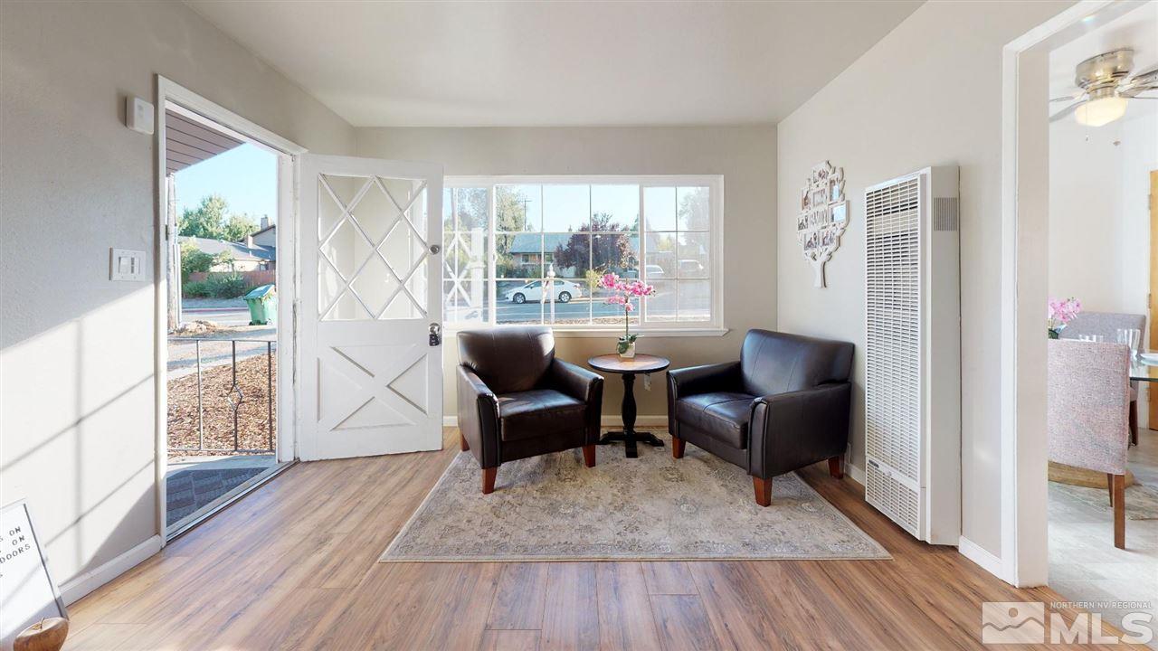 1860 Keystone Avenue Reno, NV 89503 - Photo 20 of 22 a living room with furniture and a large window