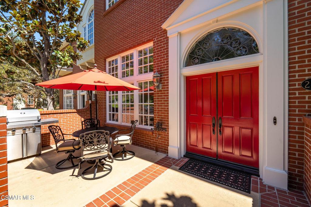 2479 Swanfield Court Lake Sherwood, CA 91361 - Photo 3 of 15 a view of a chairs and tables in the patio