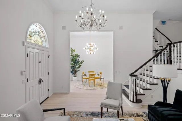 a view of entryway with livingroom