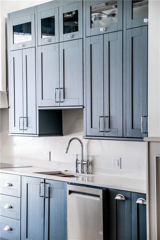 915 Liberty Avenue, Unit 701 Pittsburgh, PA 15222 - Photo 15 of 50 a kitchen with stainless steel appliances granite countertop a sink and a microwave