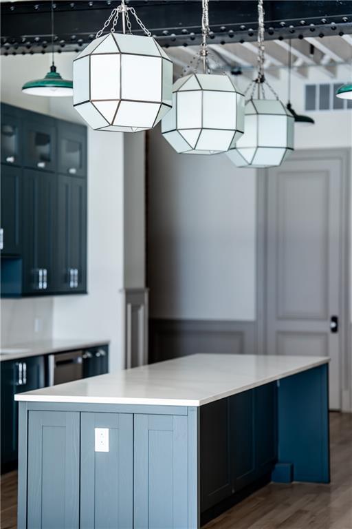 915 Liberty Avenue, Unit 701 Pittsburgh, PA 15222 - Photo 17 of 50 a kitchen with a refrigerator and a sink