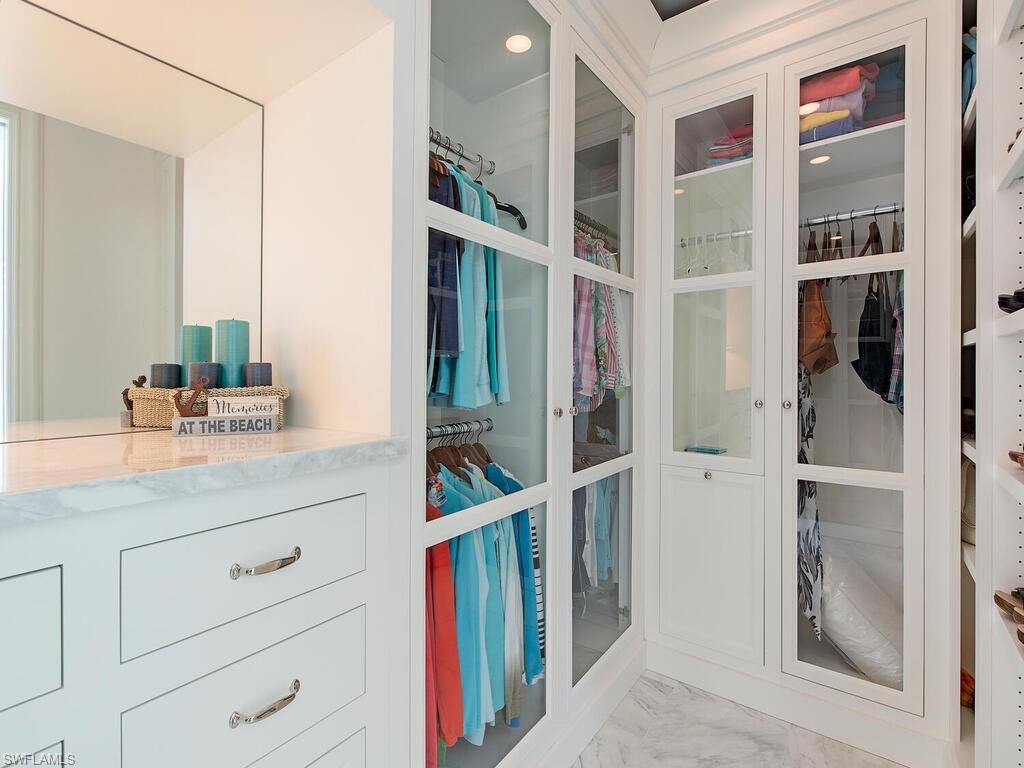 3630 Rum Row Naples, FL 34102 - Photo 14 of 28 a bathroom with a shower and a sink