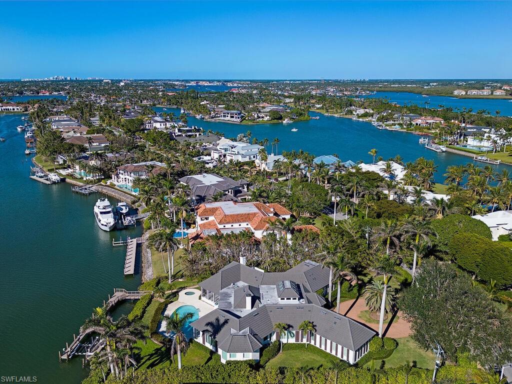 3630 Rum Row Naples, FL 34102 - Photo 27 of 28 an aerial view of residential building with outdoor space