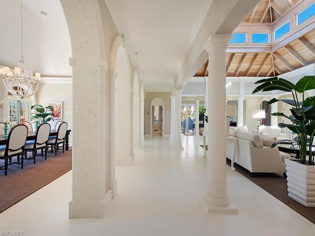 3630 Rum Row Naples, FL 34102 - Photo 10 of 28 a view of a living room and dining room