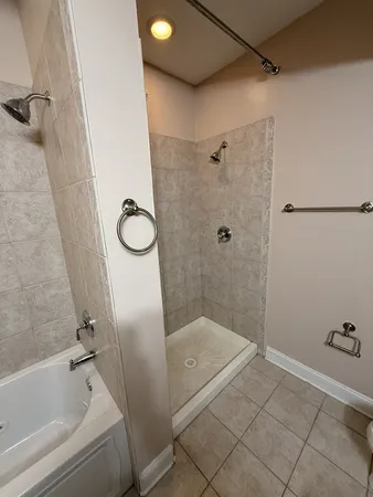 a bathroom with a sink and a shower