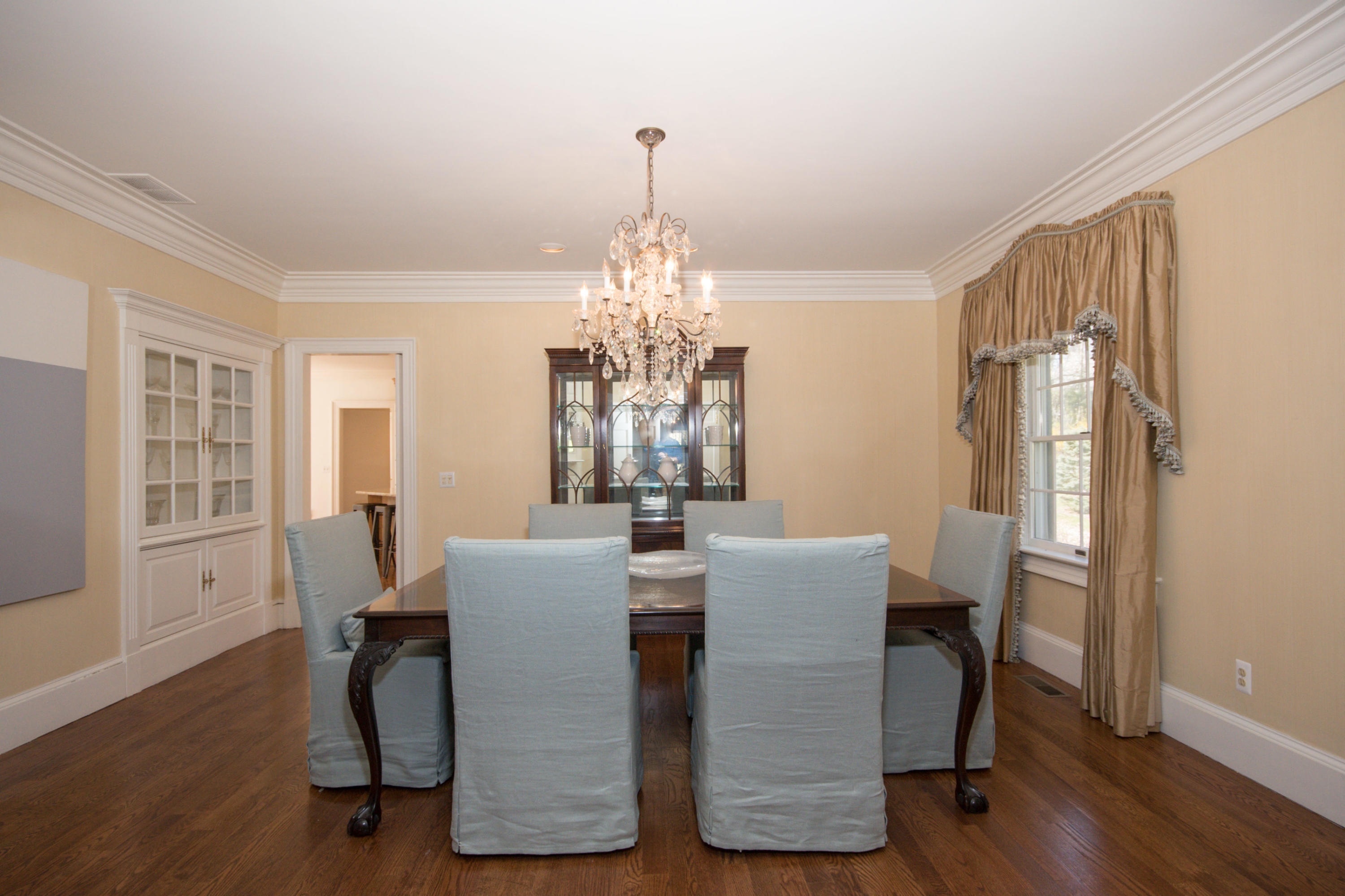 123 Lone Tree Farm Road New Canaan, CT 06840 - Photo 8 of 26 a view of a dining room with furniture window and wooden floor