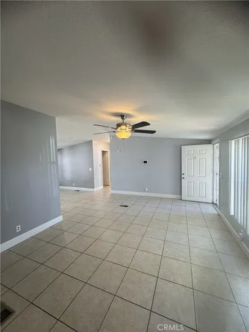 a view of a hallway with windows