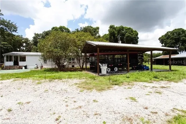 a front view of a house with a garden and entryway
