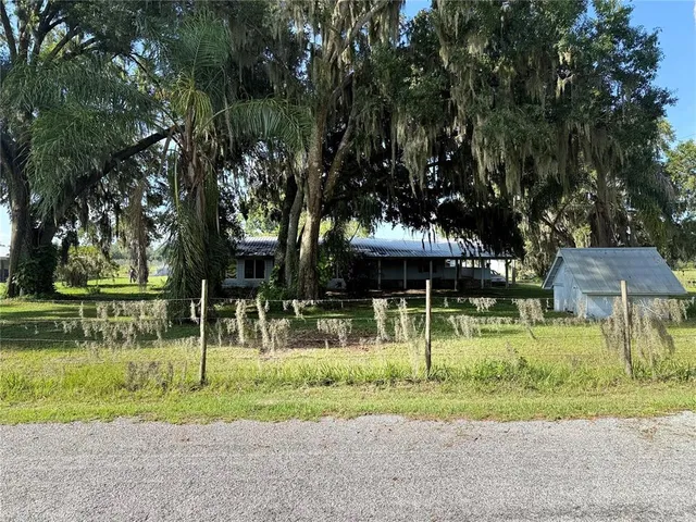 a view of swimming pool with a bench