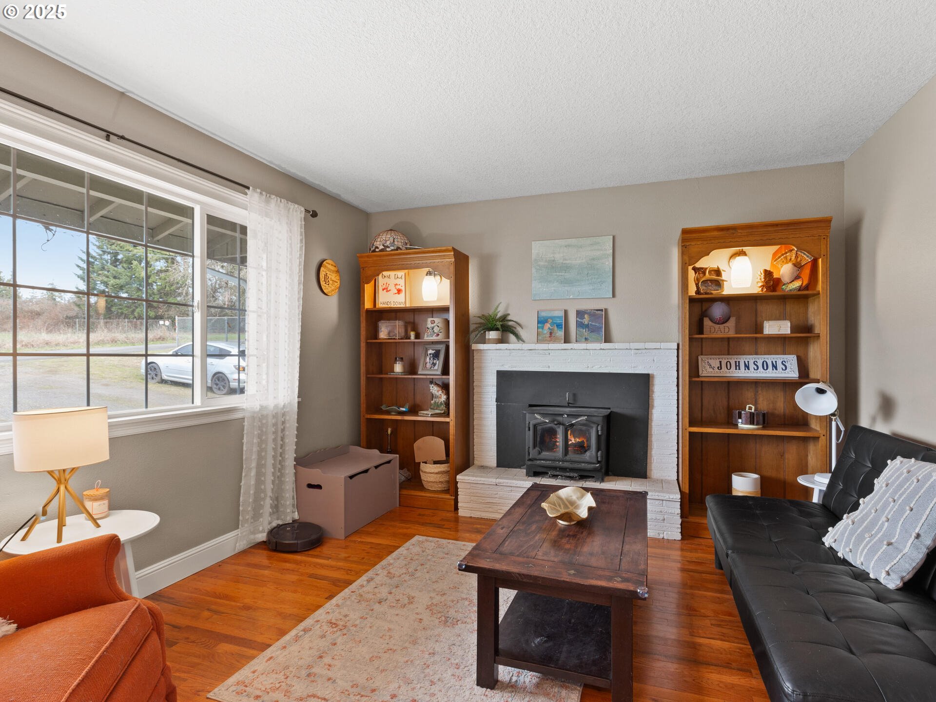 1621 Northeast 194th Street Ridgefield, WA 98642 - Photo 11 of 48 a living room with furniture and a fireplace