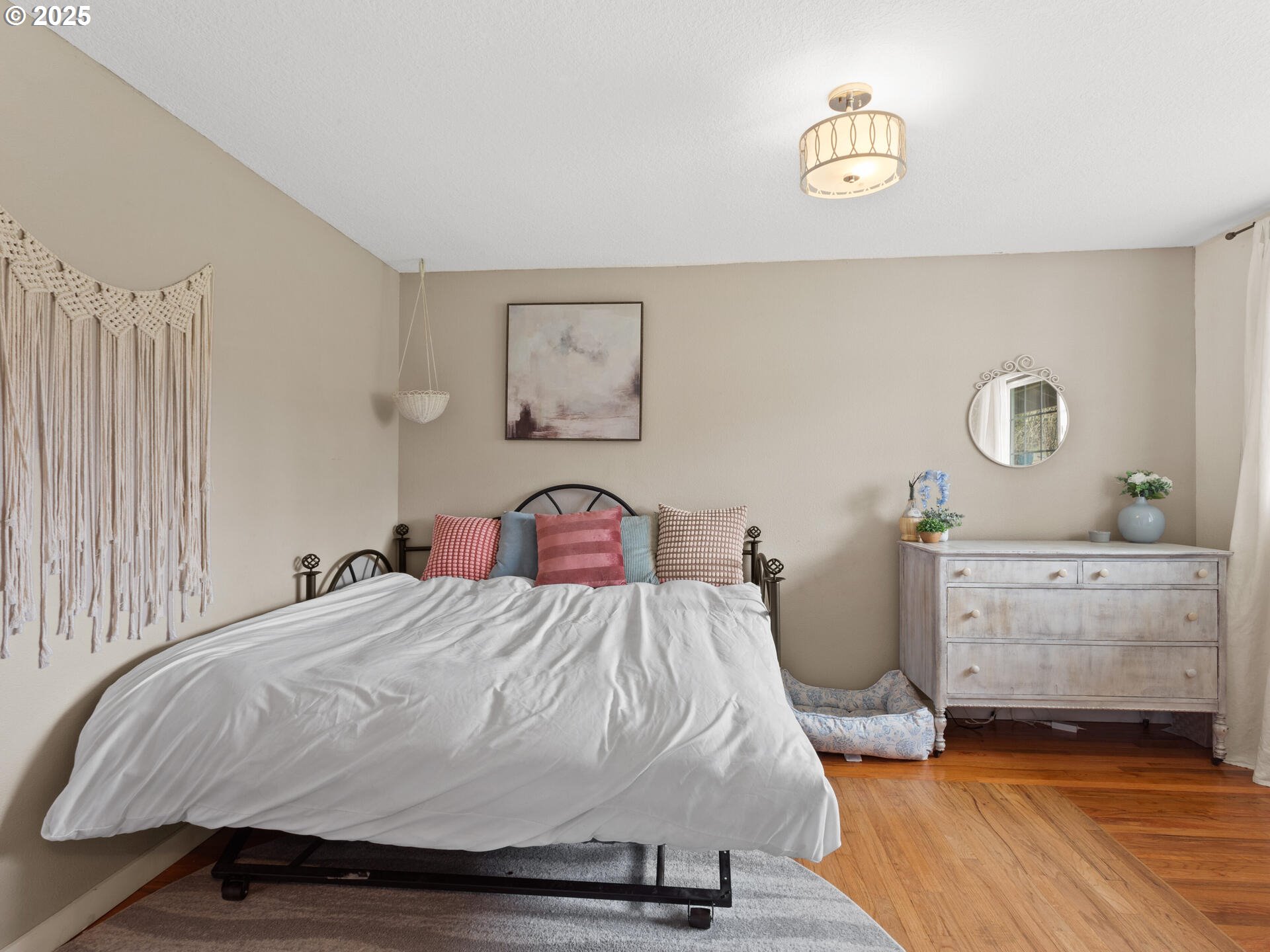 1621 Northeast 194th Street Ridgefield, WA 98642 - Photo 12 of 48 a bedroom with a bed and a table
